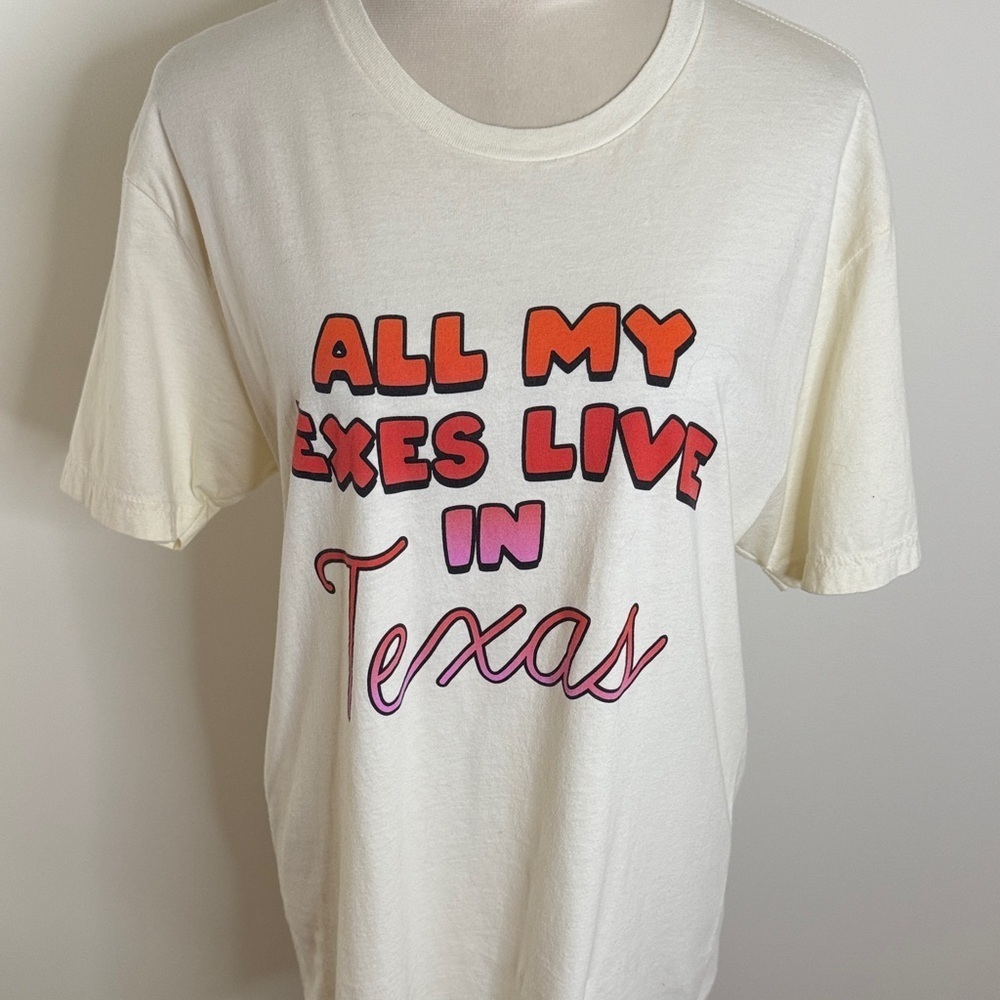 Next Level Apparel Cream Tee with Vibrant Text